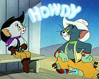 The cowgirl and Tom (from "Texas Tom", 1950) - Click here to listen to the "Look Me Up" song that Tom mimes to while trying to impress her (MP3 format - 433 KB)